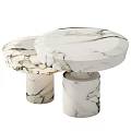 Elegant Round Marble Coffee Tables With Natural Veins And Cylindrical Bases