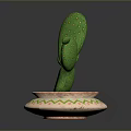 Green Cactus With Paddle Shaped Stems Yellow Dots In Decorative Pot With Colorful Geometric Patterns