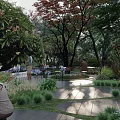 Park Landscape With Lush Trees Colorful Flowers And People Enjoying Sunlight