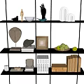 Decorative Ornament Collection on Black Shelf with Hand Sculpture Mask Photo Frame Apple and Books