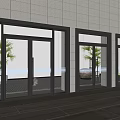 Double Doors With Glass Material Black Frame Gray Tile Wall And Green Plants