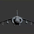 Light Gray Military Jet Model With Red Blue Markings And Weapon Attachments