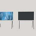 Two TVs on Tripod Stands with Blue Forest Snow Scene and Black Screen