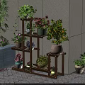 Multi tiered Wooden Plant Stand With Various Potted Flowers And Green Plants Outdoors