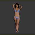 Woman in Blue Bikini Standing with Hands on Head Against Gray Background