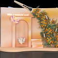 Floral Installation Featuring Orange Flowers Swing Archway Steps And Butterfly In Wonderful World Theme