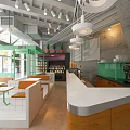 Modern Open Café Interior With Green Plants Wooden Bar Counter White Top And Pendant Lights