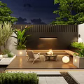 Evening Courtyard Garden with Wooden Deck Fire Pit Seating Lush Green Plants and Round Lighting