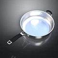 Stainless Steel Frying Pan With Black Handle And Shiny Reflective Surface
