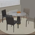 Round Dining Table With Four Black And Gray Chairs Fruits And Books On Round Rug