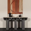 Modern Console Table With Abstract Painting And Decorative Items On Dark Floor