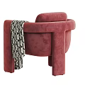 Cozy Red Fabric Accent Chair With Black And White Geometric Pattern Blanket
