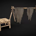 Rustic Wooden Frame with Hanging Cloths and Simple Wooden Stool
