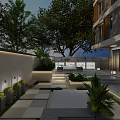 Modern Garden Landscape With Stone Paving Green Plants Lighting Water Feature And Building Facade