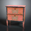 Vintage Pink Chest Of Drawers With Green Decorations And Slender Legs