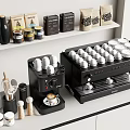 Two Black Coffee Machines With White Cups Coffee Bean Packages And Utensils On Kitchen Counter
