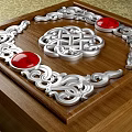 Intricate Silver Carving Art on Wooden Tray with Red Gemstones and Chinese Knot Design