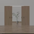 Open Wooden Sliding Doors With Green Plant In Gray Planter And Wooden Floor