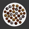 Assorted Chocolate Candies on Golden Pedestal Stand with Striped and Round Toppings