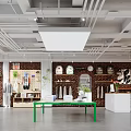 Modern Clothing Store Interior With Brick Wall Clothing Racks Decorative Clocks And Green Display Table