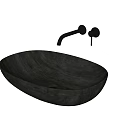 Black Oval Shaped Wash Basin With Wall Mounted Faucet And Control Knob In Modern Design