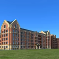 Classic Red Brick Multi Story School Building With Gabled Roofs Front Lawn Against Blue Sky