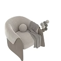 Cozy Cream Colored Single Sofa With Brown Armrests Round Pillow And Gray Blanket
