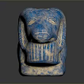 Blue Ram Sculpture With Carved Details And Textured Surface On Dark Base