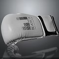 White And Black BRAVOX Boxing Gloves With Striped Design On Gray Reflective Surface
