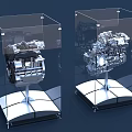 Detailed Engines Exhibited in Transparent Display Cases with Silver Stands