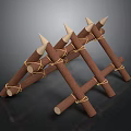 Primitive Handmade Triangular Defensive Structure With Wooden Sticks Ropes And Spikes