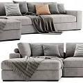 Modern Gray Sectional Sofa Featuring Plush Pillows And Cozy Blankets For Comfortable Seating 3d model