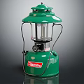 Vintage Green Coleman Candle Lantern With Classic Design And Metal Frame