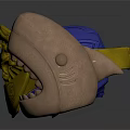 Decorative Ornaments Including Blue Helmet Gold Dragon Ring And Brown Creature Head