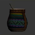 Handcrafted Decorative Cup With Colorful Woven Patterns And Leather Accents And Straw