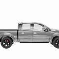 Gray Ford Pickup Truck With Black Wheels And Red Brake Calipers