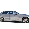 Silver Mercedes Benz Sedan With Modern Front Grille Headlights And Alloy Wheels