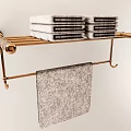Stylish Bathroom Accessories Golden Towel Rack With Folded Towels And Hanging Towel