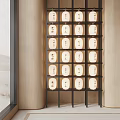 White Lanterns With Black Characters In Black Metal Frame On Wooden Wall