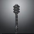 Ornate Decorative Column With Intricate Layered Carvings And Metallic Surface Against Dark Background