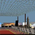 Vibrant Commercial Street With Decorative String Lights Folding Chairs And Outdoor Umbrellas Under Evening Sky