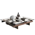Modern Coffee Table With Glass Top Wooden Frame And Decorative Books Lamp And Vase