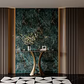 Elegant Entryway Design With Green Marble Backdrop Gold Trim Curved Console Table And Geometric Rug