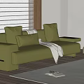 Green Velvet Double Sofa With Pillows And Blanket On Wooden Floor Near Roller Blinds