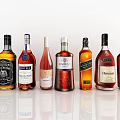 Assorted Whiskey Bottles and Elegant Glasses Arranged in a Row on White Surface