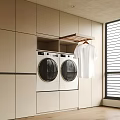 Beige Built in Laundry Area With Front Loading Washing Machines And White Shirt