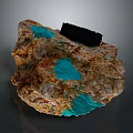 Garden Landscape With Natural Rock Featuring Turquoise Spots And Black Object On Surface