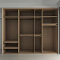 Modern Minimalist Light Colored Wardrobe Interior With Sleek Cabinet Doors And Drawers