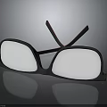 Stylish Black Rectangular Glasses With Red Accent Temple Arms Placed On Dark Reflective Surface