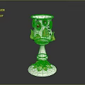 Elegant Decorative Cup With Silver Body Gold Accents Red Gemstones And Leaf Base